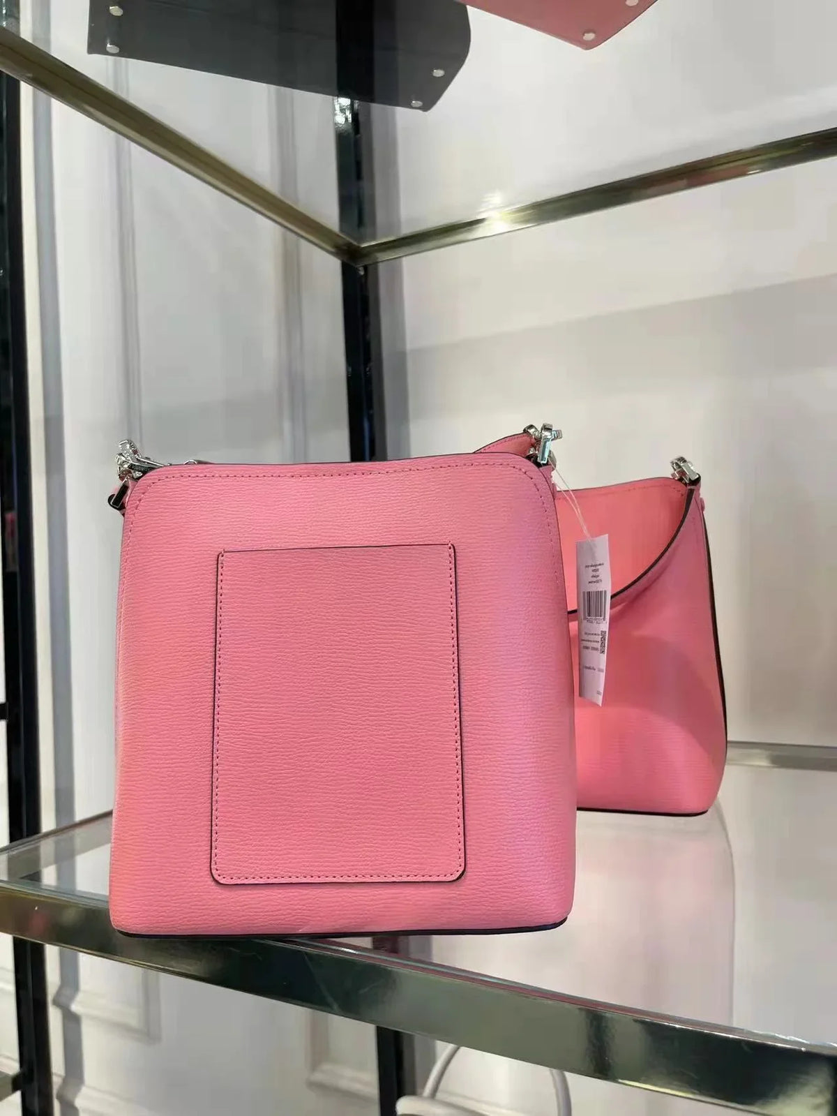 WKR00439 Peach in Kate bag Spade bucket small darcy Nectar